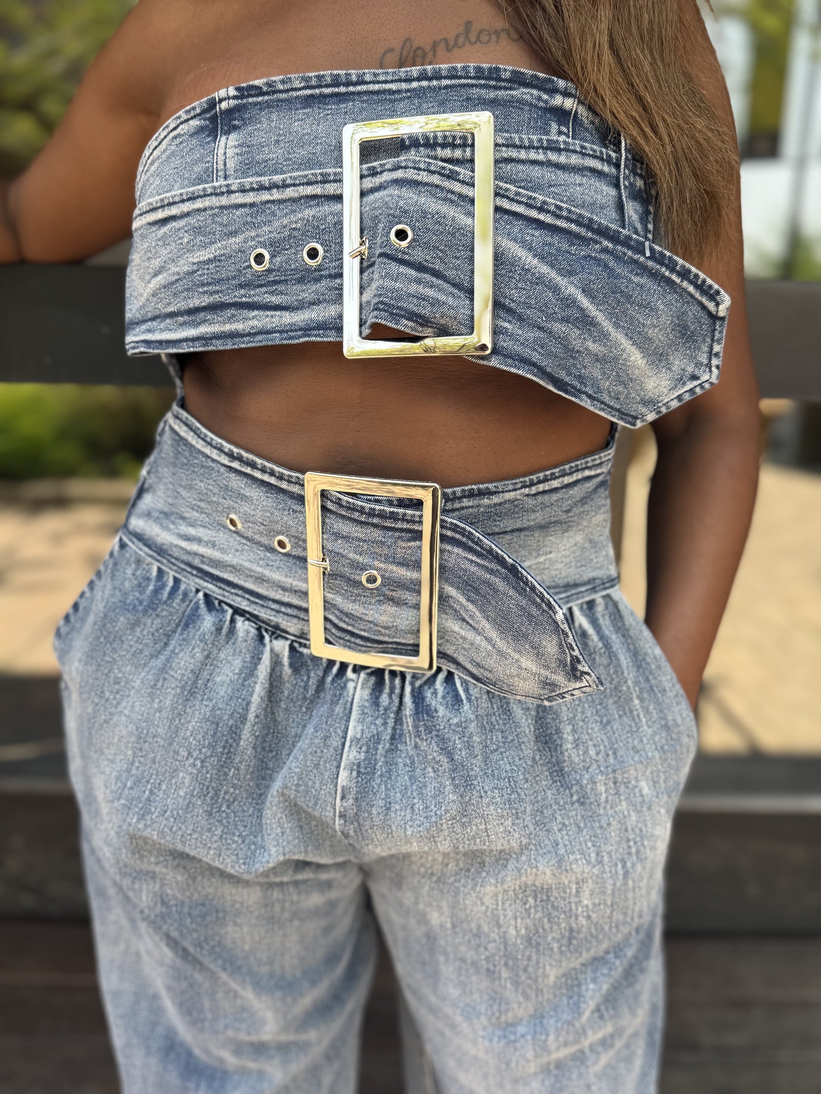 BUCKLES AND BANDS JUMPSUIT