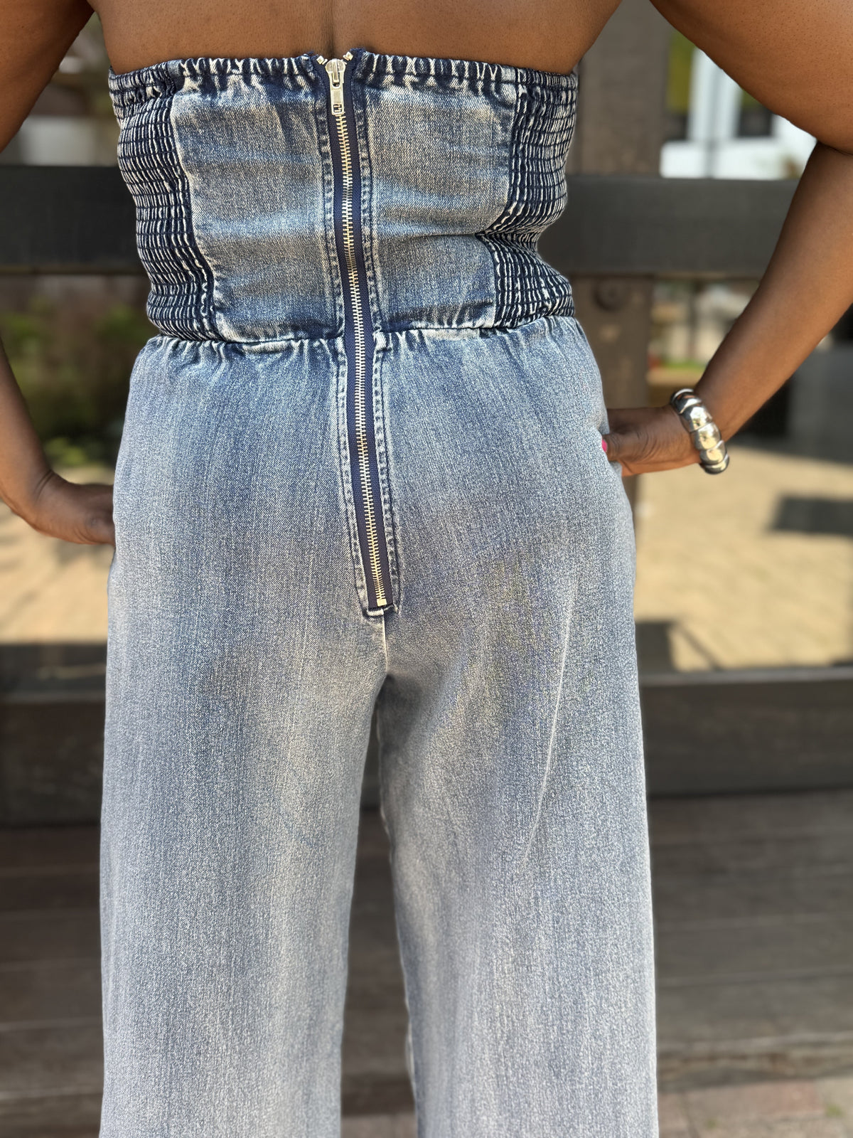 BUCKLES AND BANDS JUMPSUIT